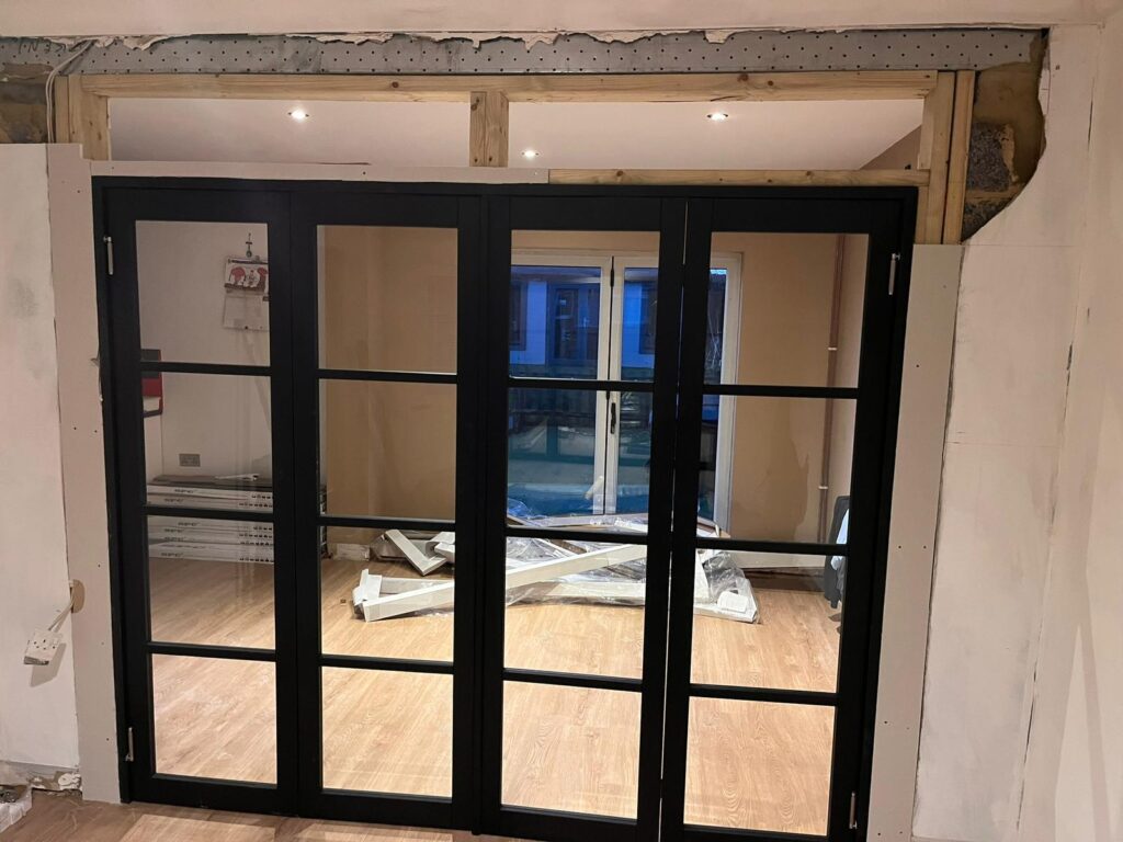 Stud Wall, Plasterboarding & Fitting of Bifold Doors and Glass Windows - Ashford, Kent