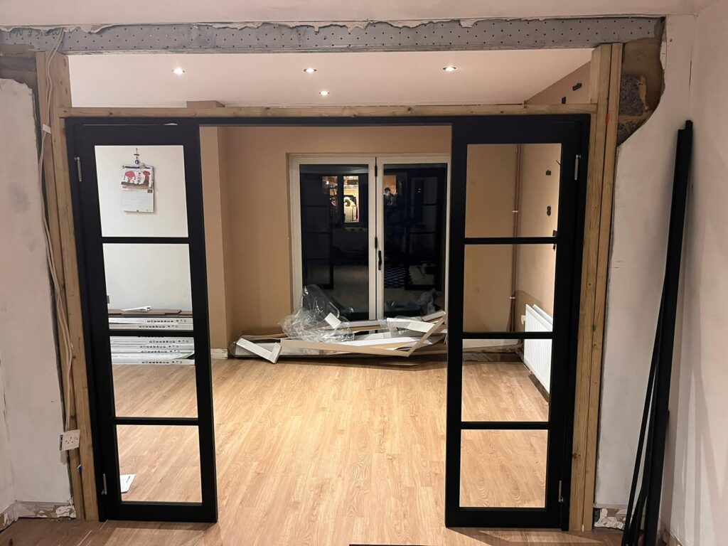 Stud Wall, Plasterboarding & Fitting of Bifold Doors and Glass Windows - Ashford, Kent