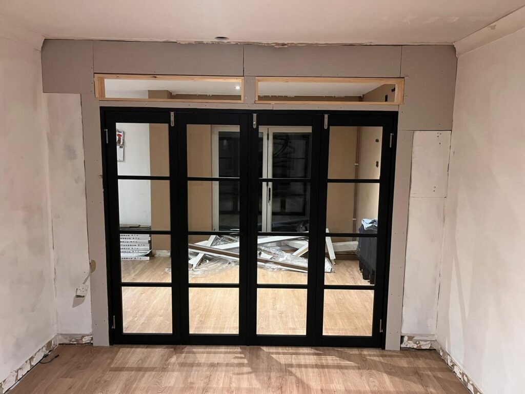 Stud Wall, Plasterboarding & Fitting of Bifold Doors and Glass Windows - Ashford, Kent